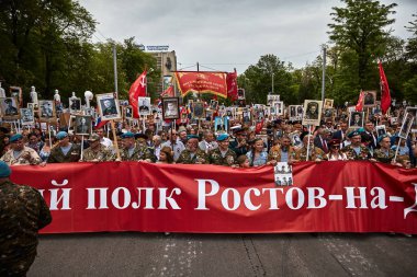 Immortal Regiment. People in the procession of the Immortal Regiment carry portraits of the participants of World War II who are no longer alive as a sign of memory. Rostov-on-Don. Russia 9.5.2018 clipart