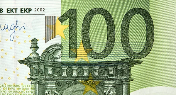 100 euró, az egységes európai valuta bankjegyei. A pénz háttere — Stock Fotó