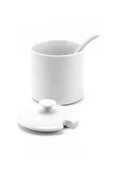Un mini tazón blanco con cuchara y tapa abierta en set — Foto de Stock