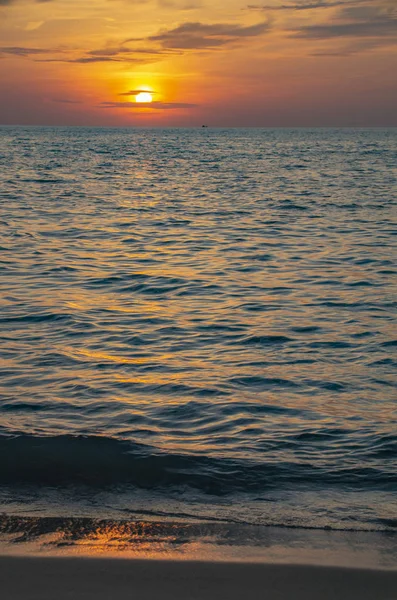 sunset on the sea, the sun sets in the water