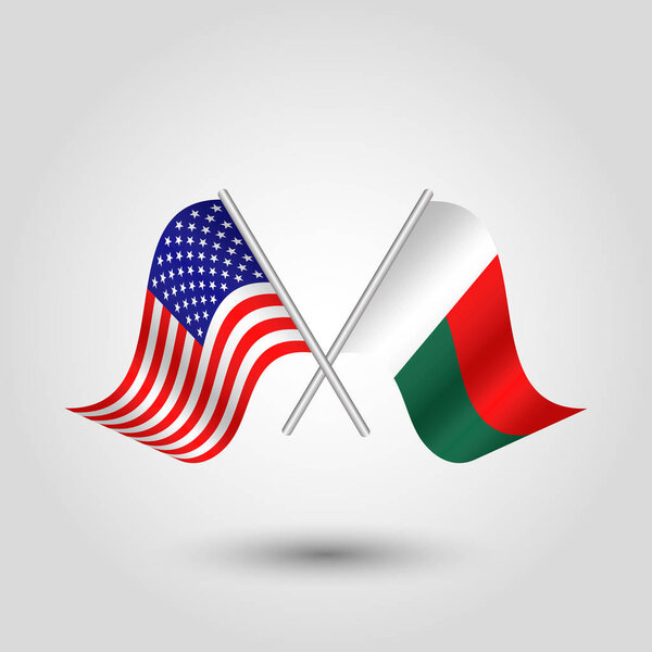 vector two crossed american and malagasy flags on silver sticks - symbol of united states of america and republic of madagascar