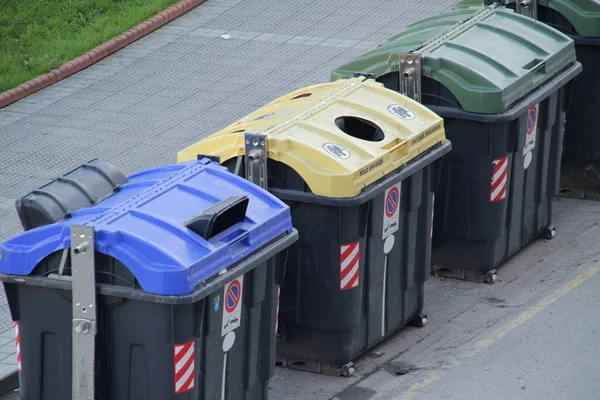 Different containers for recycling wastes