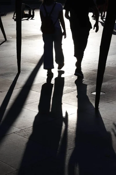 Evening shadows and silhouettes in the downtown of Bilbao