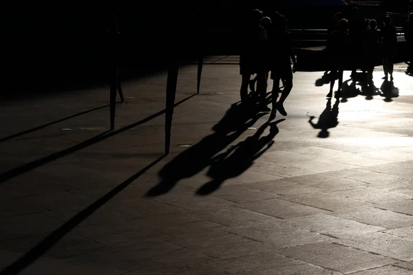 Evening shadows and silhouettes in the downtown of Bilbao