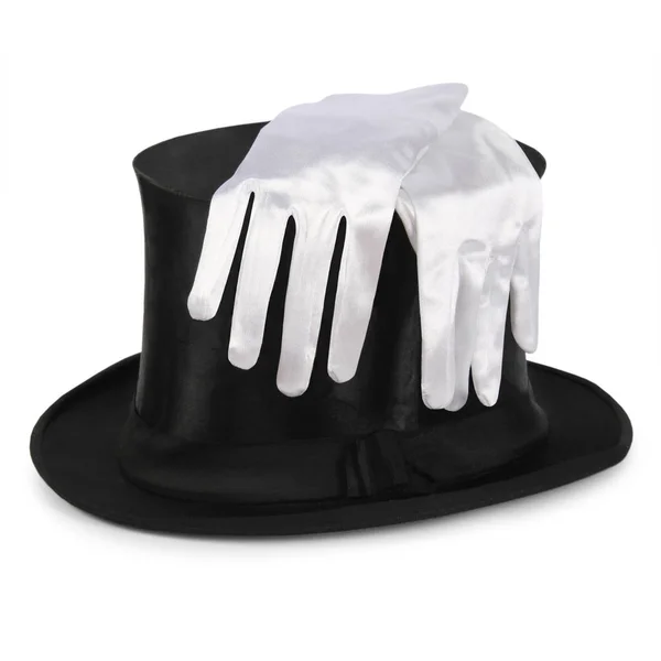 白い背景に分離された白い手袋のペアを持つ黒のシルクハット — ストック写真