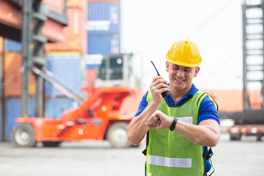 Foreman using radio communication control loading container