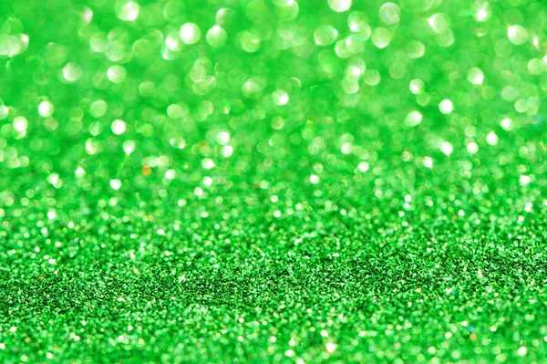 緑のキラキラ ライトの背景 デフォーカス — ストック写真