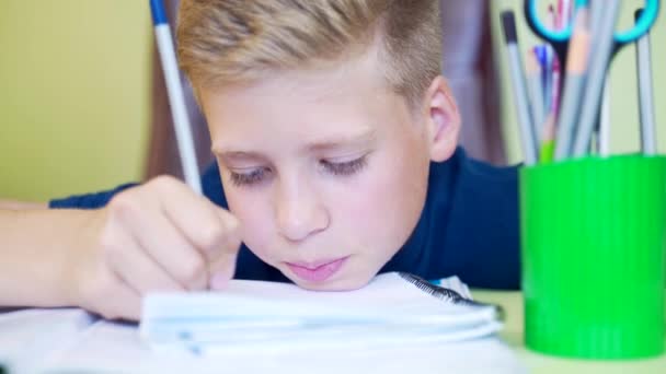 Portrait Tired Young Blond Boy Who Teaches Lessons Book Notebook — Stock Video