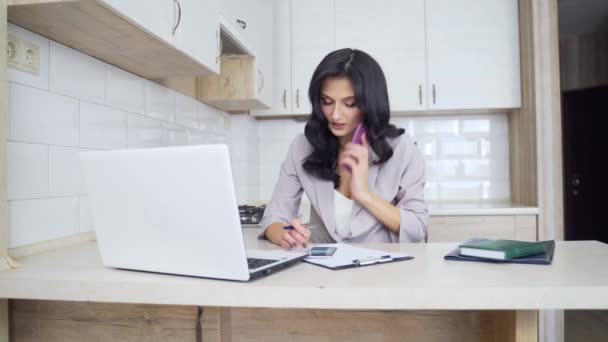 Young Attractive Sexy Businesswoman Talking Smartphone Making Notes Bright Kitchen — Stock Video