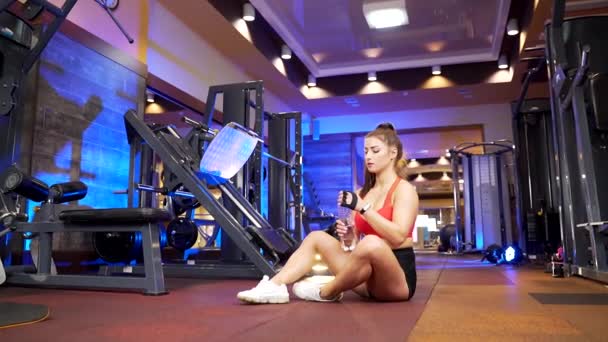 Pretty Young Woman Sport Clothing Relaxing Morning Workout Fitness Center — Stock Video