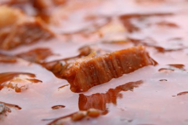 Sığır eti bir tencereye güveç. Ayrıntılar. Arka plan