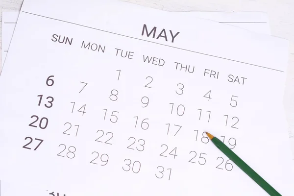 Concept image of May Calendar. Calendar to remind you an important appointment with pen.