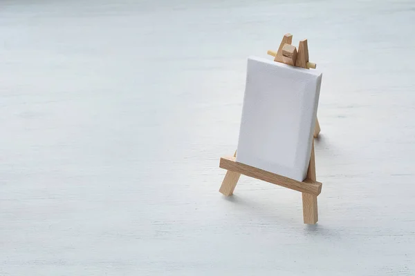 Close View Blank Canvas Miniature Easel White Wooden Background Art — Stock Photo, Image