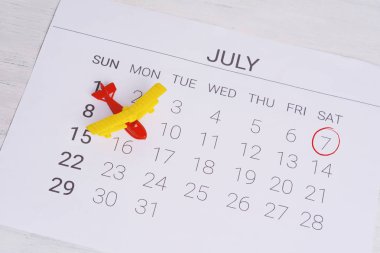 Yaz takvim programı, oyuncak uçak ile. Seyahat, turizm, tatil kavramı.