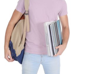 Defter ve çanta ile öğrenci görünümünü kapatın. Eğitim kavramı. İzole beyaz arka plan