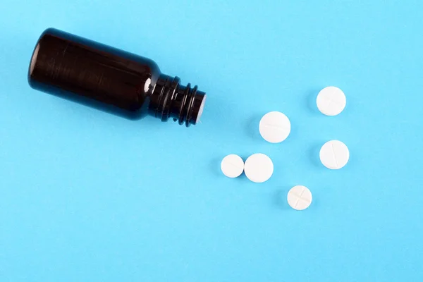 Top View Pile White Pills Light Blue Background Medicine Concept — Stock Photo, Image