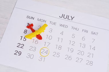 Yaz takvim programı, oyuncak uçak ile. Seyahat, turizm, tatil kavramı.