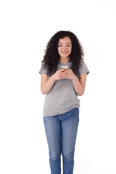 Junge Schöne Frau Mit Ihrem Smartphone Innenraum Isolierter Weißer Hintergrund — Stockfoto