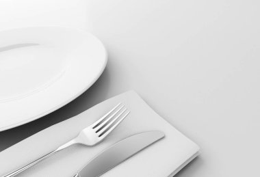 3D çizim. Çatal ve bıçak plakalı beyaz arka plan üzerinde izole.