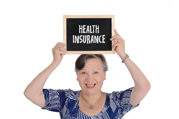Elderly Woman Holding Chalkboard Text Health Insurance Her Hands Isolated — Stock Photo, Image