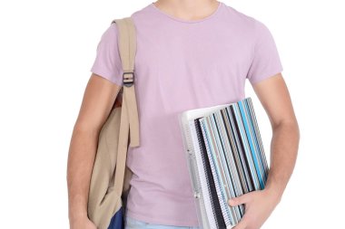 Defter ve çanta ile öğrenci görünümünü kapatın. Eğitim kavramı. İzole beyaz arka plan