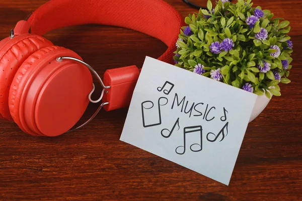Red Headphones Paper Music Text Wooden Background Lifestyle Concept — Stock Photo, Image