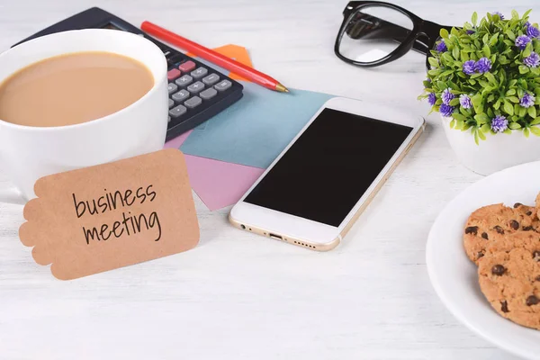 Paper Card Business Meeting Text Coffee Phone Calculator Cookies Glasses — Stock Photo, Image