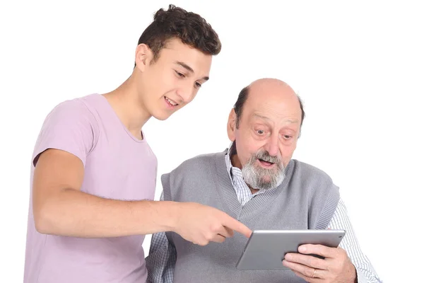 Tonårspojke Visar Mormor Hur Man Använder Digital Tablett Teknik Konceptet — Stockfoto