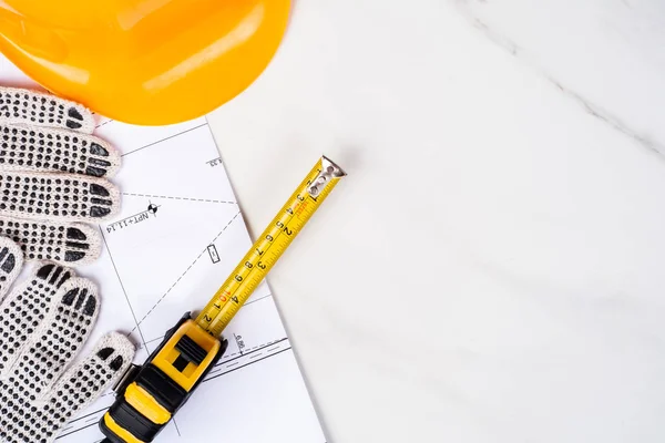 Close Blueprints Measuring Tape Gloves Yellow Construction Helmet Engineer Concept — Stock Photo, Image