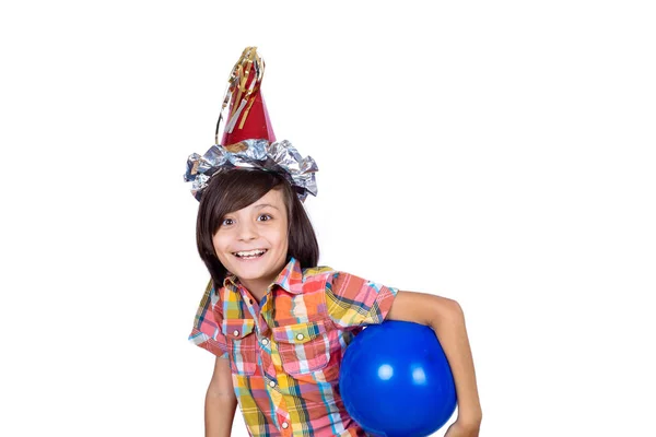 Jongetje met feest hoed en ballon. — Stockfoto