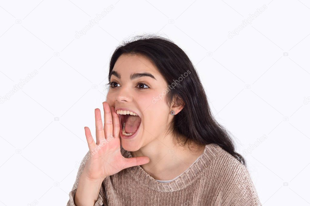 Young woman shouting and screaming