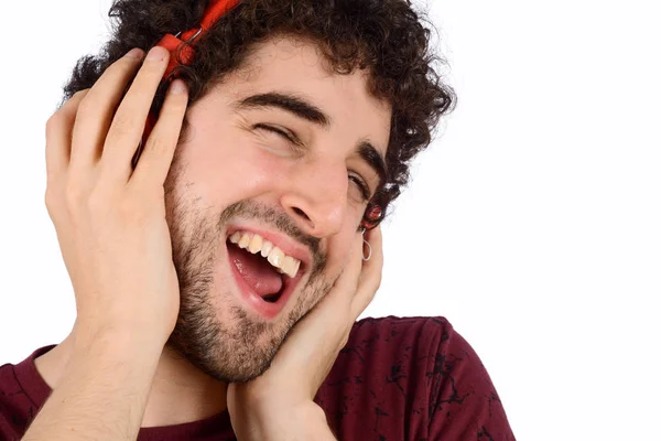 Młody człowiek zabawny ze słuchawkami — Zdjęcie stockowe