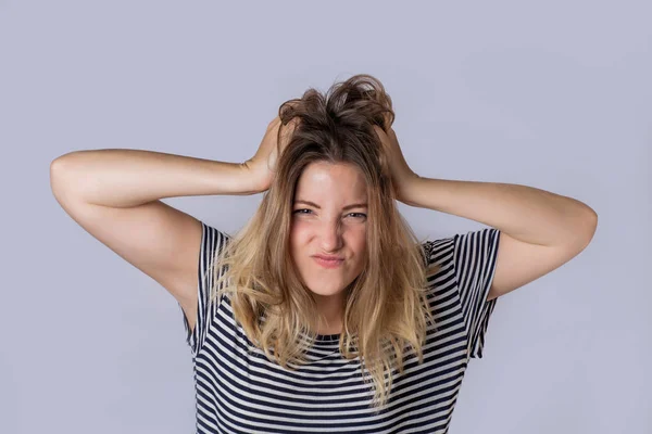 Young woman with weird expression