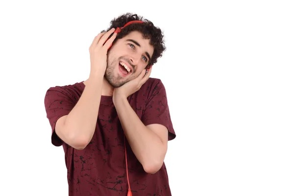 Joven divertido hombre con auriculares — Foto de Stock