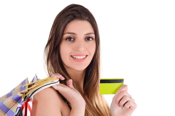 Mulher segurando cartão de crédito. — Fotografia de Stock