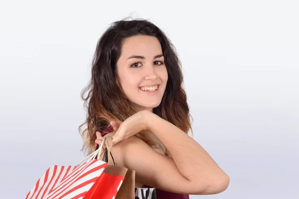 Mulher segurando sacos de compras — Fotografia de Stock