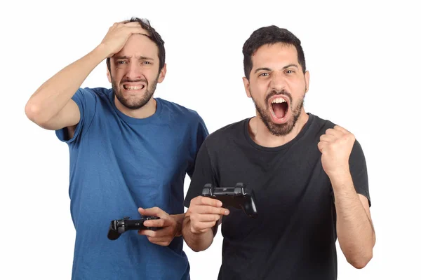 Twee vrienden spelen van videospellen. — Stockfoto