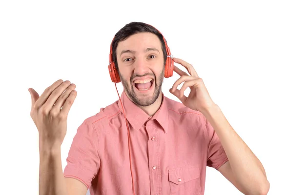 Joven divertido hombre con auriculares — Foto de Stock