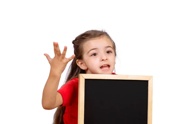 Menina segurando quadro . — Fotografia de Stock