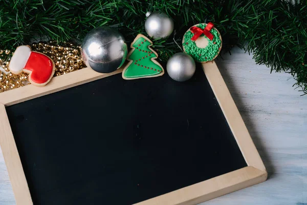 Empty chalkboard and decorative ornaments. — Stock Photo, Image