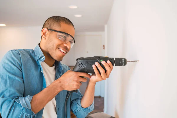 Portrait Young Latin Man Electric Drill Making Hole Wall Interior — Stock Photo, Image
