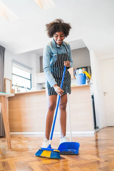 Portrait Young Afro Woman Sweeping Wooden Floor Broom Home Cleaning — Stock Photo, Image