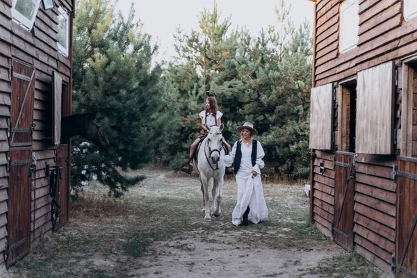 Daughter Riding Horse Mother Walking Together Full Length Shot — Stock Photo, Image