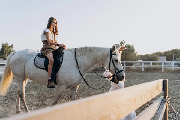 Side View Woman Holding Bridle Daughter Riding Horse Ranch — Stock Photo, Image