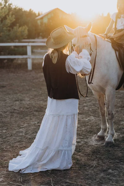 Girl Riding Horse While Mother Stroking Her Horse Ranch Sunset — Stock Photo, Image