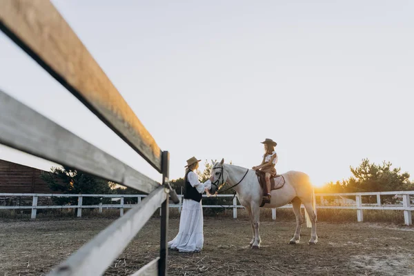 Full Length Shot Mother Stroking White Horse Daughter Sitting Her — Stock Photo, Image