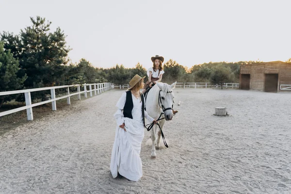 Full Length Shot Woman Holding Bridle Girl Sitting Horse Ranch — Stock Photo, Image