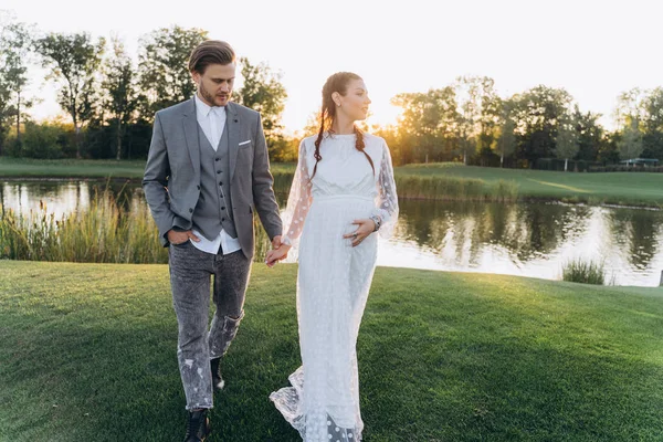 Beautiful Pregnant Woman White Dress Handsome Man Holding Hands Walking — Stock Photo, Image