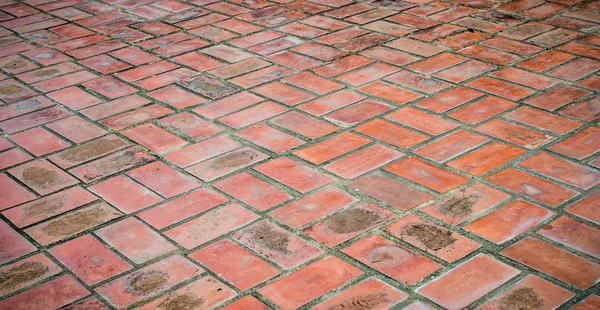 Eski kahverengi tuğla zemin.