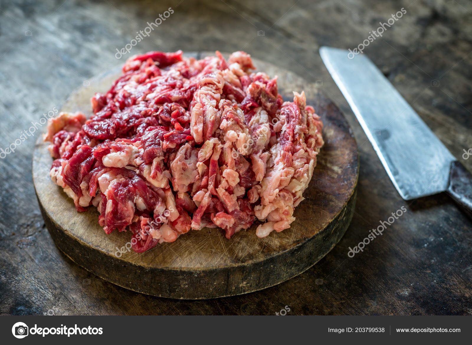 Shredded Raw Beef Cutting Board Knife Stock Photo by ©sosconcan 203799538